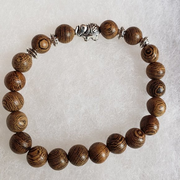 Other - 2/15$ NWOT Elephant wood stretch bracelet
